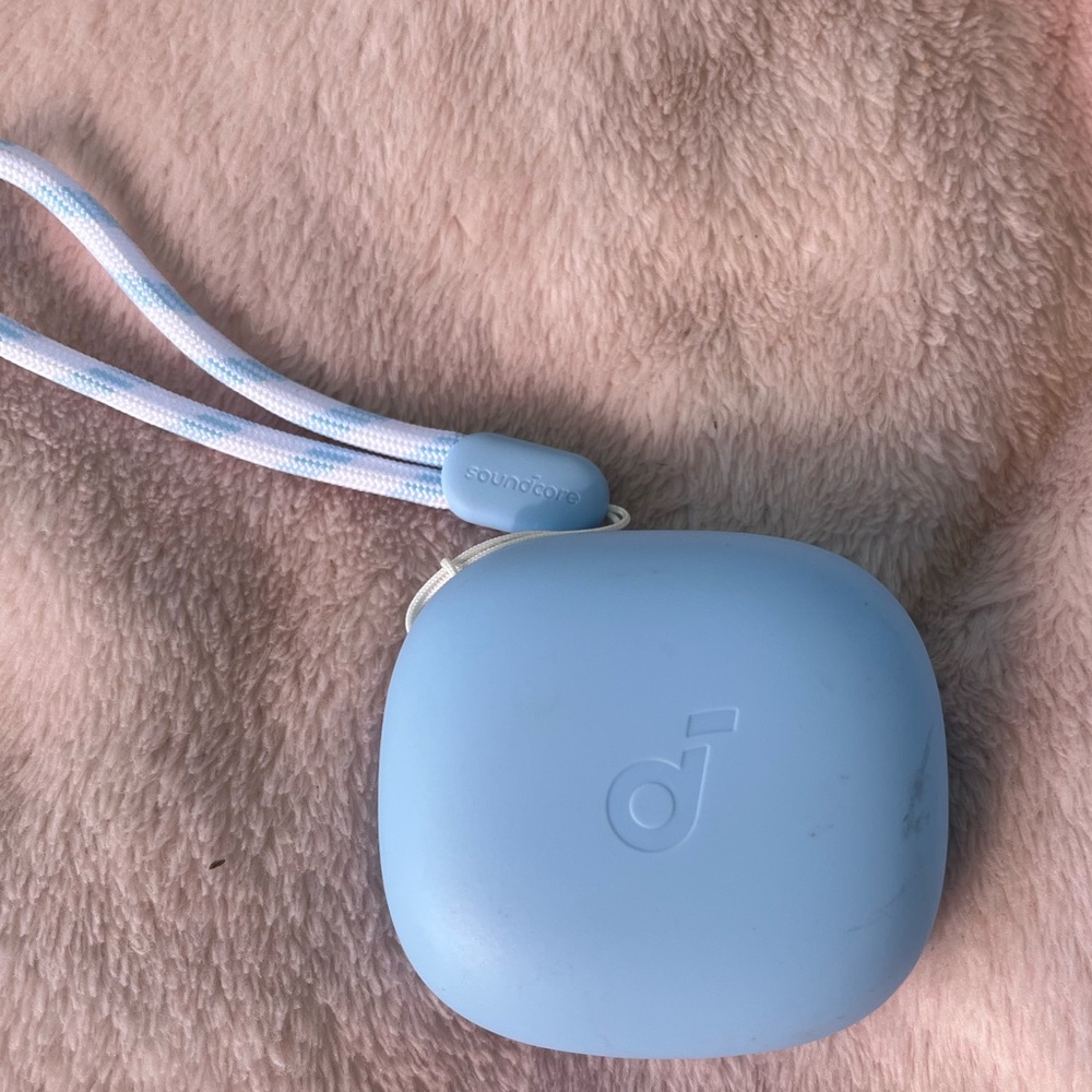 Soundcore Light Blue Earbuds with Wrist Strap